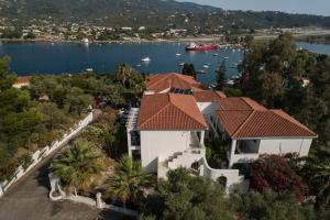 an aerial view of a house with a lake at Anamar Skiathos Hotel in Punta