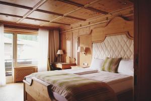 Posteľ alebo postele v izbe v ubytovaní Burg Hotel Oberlech