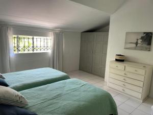 Postel nebo postele na pokoji v ubytování Villa Laposte + 17 fotografií