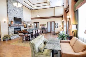 a living room with a couch and a fireplace at Hampton Inn & Suites Pinedale in Pinedale