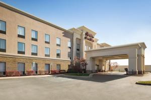 a hotel with a parking lot in front of it at Hampton Inn & Suites Detroit Sterling Heights in Sterling Heights