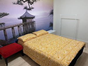 Postel nebo postele na pokoji v ubytování Sky World Cozy Home