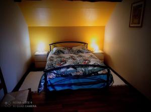 Ένα ή περισσότερα κρεβάτια σε δωμάτιο στο Gîte Vergnelibert +16 φωτογραφίες