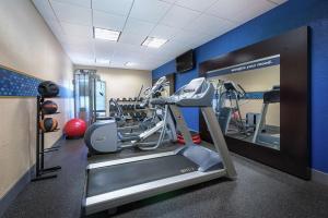 a gym with a treadmill and tread machines at Hampton Inn Tuscaloosa-University in Tuscaloosa
