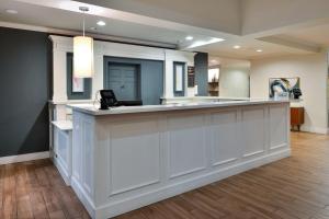 a lobby with a counter with a phone on it at Hilton Garden Inn Napa in Napa