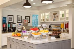 a kitchen with bowls of fruit on a counter at Homewood Suites by Hilton Las Vegas Airport in Las Vegas