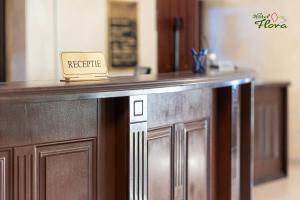 Kuchyň nebo kuchyňský kout v ubytování Hotel Flora