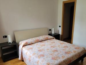 Postel nebo postele na pokoji v ubytování Casa IBISCO