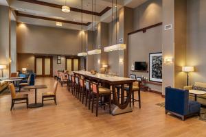 a large dining room with a long table and chairs at Hampton Inn & Suites Portland/Vancouver in Vancouver