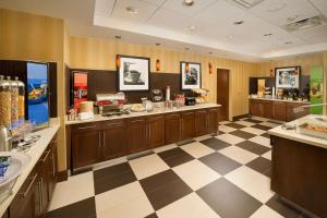 a large room with a checkered floor at Hampton Inn Temple in Temple