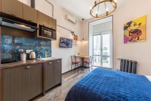 Kuchyň nebo kuchyňský kout v ubytování DayFlat Apartments