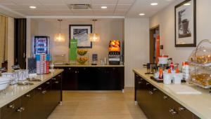 a hair salon with two counters in a room at Hampton Inn & Suites New Albany Columbus in New Albany