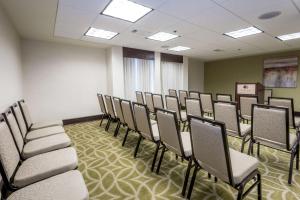 a room with a bunch of chairs in it at DoubleTree by Hilton Montgomery Downtown in Montgomery