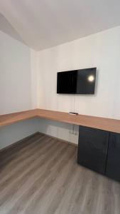 TV a/nebo společenská místnost v ubytování Modernes Apartment