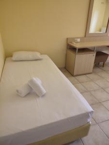 Postel nebo postele na pokoji v ubytování Saint Nicholas Hotel
