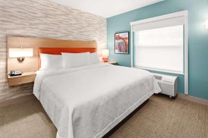 Home2 Suites By Hilton North Conway, NH客房内的一张或多张床位