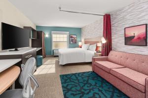 Home2 Suites By Hilton North Conway, NH的电视和/或娱乐中心