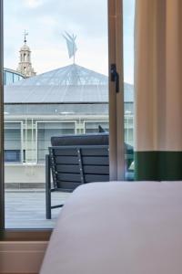 Postel nebo postele na pokoji v ubytování Cosmo Hotel Boutique