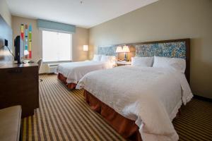 Postel nebo postele na pokoji v ubytování Hampton Inn & Suites Port Arthur