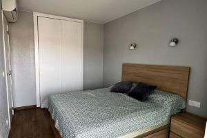 Postel nebo postele na pokoji v ubytování Apartamento acogedor , Blanes + 6 fotografií