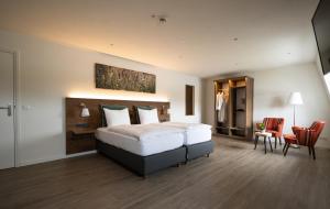 Un pat sau paturi într-o cameră la Valuas