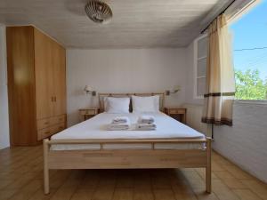 Voodi või voodid majutusasutuse ELENA APARTMENTS ITHACa toas
