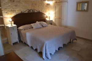 En eller flere senge i et værelse på Il Gelso Selvatico