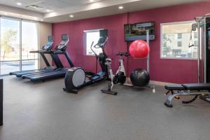 a gym with treadmills and exercise bikes in a room at Home2 Suites By Hilton Page Lake Powell in Page