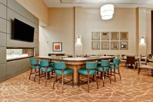 a conference room with a large table and chairs at Homewood Suites by Hilton Palo Alto in Palo Alto