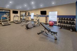 a gym with several treadmills and exercise bikes at Hampton Inn Arkadelphia in Arkadelphia