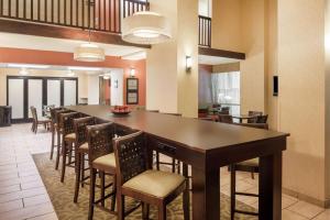 a large dining room with a long table and chairs at Hampton Inn Branson on the Strip in Branson