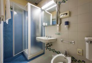 Koupelna v ubytování Hotel Reale