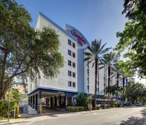 a rendering of the exterior of a hotel at Hampton Inn Miami-Coconut Grove/Coral Gables in Miami