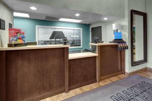 a dental office with a reception desk and a counter at Hampton Inn Miami-Coconut Grove/Coral Gables in Miami