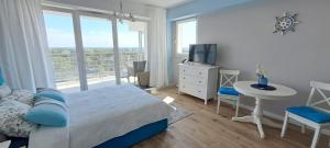 Postel nebo postele na pokoji v ubytování Apartament PORTA MARE 275 Wes Quality Suite