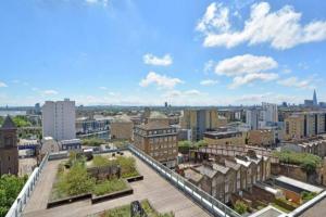 a view of a city from a building at Spacious 3 bed with city views in Limehouse in London