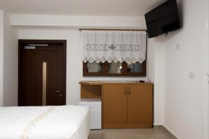 Postel nebo postele na pokoji v ubytování Guesthouse Çani