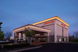 a grocery store with a sign on the front of it at Hampton Inn Shelbyville in Shelbyville