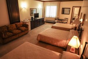 Nobile Suites Excelsior Asuncionにあるベッド