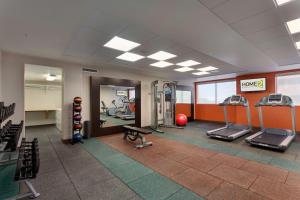 a gym with treadmills and machines in a room at Home2 Suites by Hilton Denver West / Federal Center in Lakewood