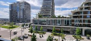 a rendering of a building with two tall buildings at Beograd na vodi - BW Terra Exclusive in Belgrade