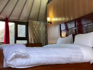Voodi või voodid majutusasutuse Apex Hotels and Resorts Hussaini toas
