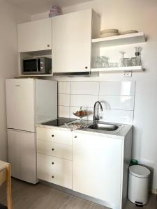 Kuchyň nebo kuchyňský kout v ubytování Beach House Buinac