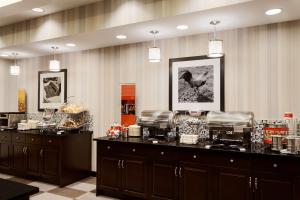 a restaurant with a buffet line with food at Hampton Inn & Suites Hershey Near the Park in Hummelstown