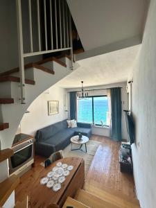 Posezení v ubytování Beach House Buinac