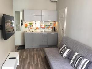 A kitchen or kitchenette at Apartment Sopot I