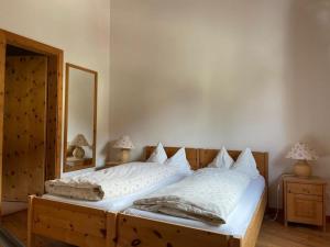 Voodi või voodid majutusasutuse Residence Miragolf toas