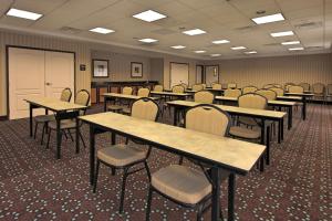 an empty classroom with tables and chairs in it at Hampton Inn Defiance in Defiance