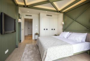 Кровать или кровати в номере Voyage Sorgun Hotel