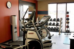 a gym with a treadmill and other cardio equipment at Hampton Inn & Suites Dallas-Arlington North-Entertainment District in Arlington